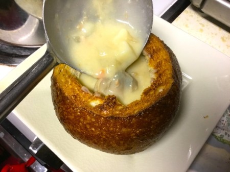Homemade Clam Chowder added to bread bowl