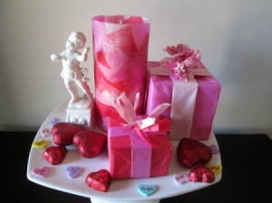 Homemade Mod Podge - decoupaged cylinder in a Valentine's Day arrangement