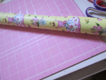 Homemade Mod Podge - wrapping paper from which the dress image was cut