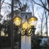 Decorative Outdoor Solar Sconces - lights on as twlight begins
