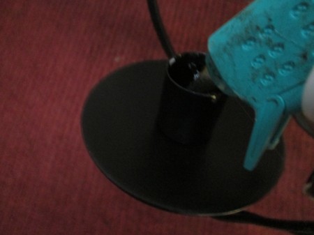 Decorative Outdoor Solar Sconces - glue being added around the candle base