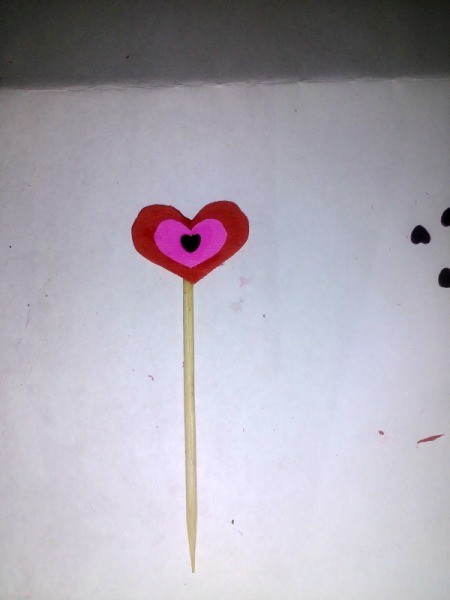 Making a Paper Valentine Tree - make a layered heart from small heart shaped pieces of paper and glue to a toothpick