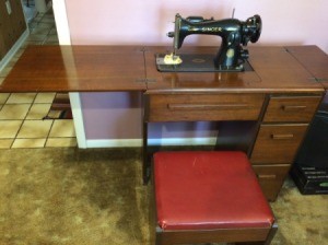 Value of a Singer 15-91 Sewing Machine - vintage machine in cabinet