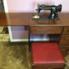 Value of a Singer 15-91 Sewing Machine - vintage machine in cabinet