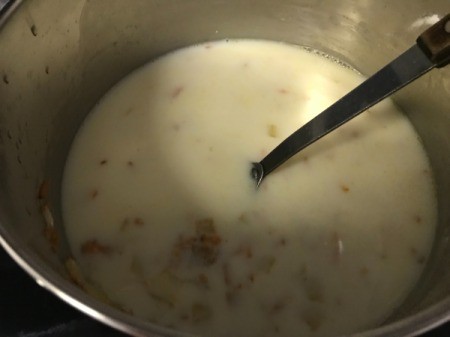 adding milk to Chowder pan