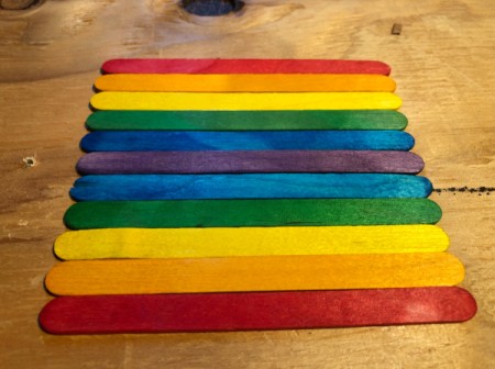 Hand Painted Popsicle Stick Puzzle - lay out Popsicle sticks side by side