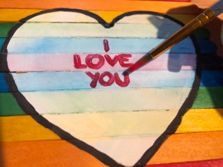 Hand Painted Popsicle Stick Puzzle - trace over text with paint and allow to dry