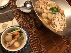 Mongolian Hot Pot with bowl of cooked foods