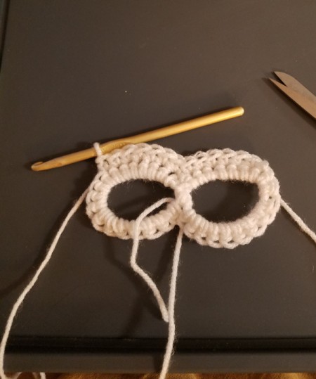Crocheted Sugar Skull - chain 18 sc around each eye and wrap the tail around the center for stability