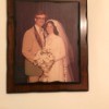 A framed picture of a wedding couple.