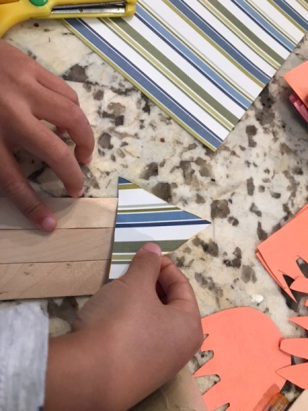 Rocketship Valentine's Day Gifts - child placing the nose on one end of the rocket