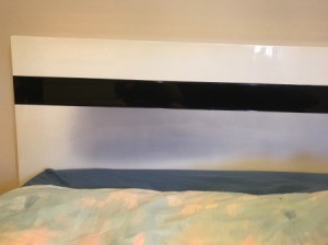 Removing a Dye Stain from a Laminate Headboard - white and black headboard