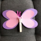 Imaginary Clothespin Flying Butterfly - pink and purple paper and clothespin butterfly