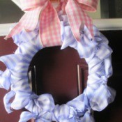 No Sew No Glue Ribbon Wreath - finished wreath hanging on a door by the ribbon bow loop hanger