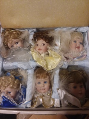 Value of Ashton Drake Doll's Heads - heads in a box