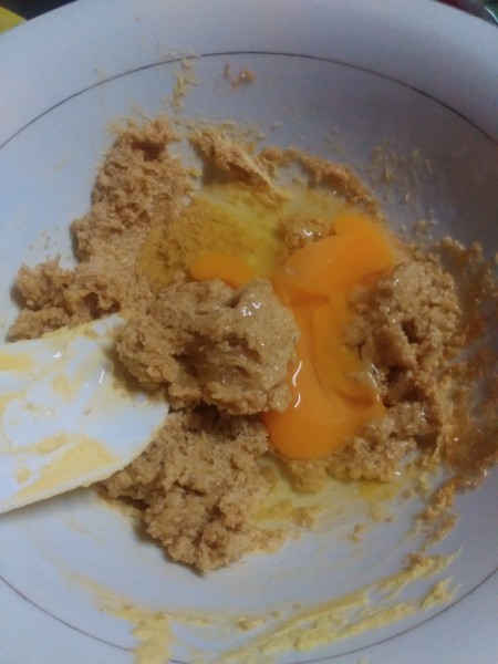 adding eggs to batter