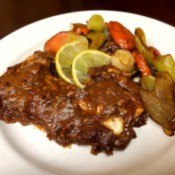 Almond Sauce Salmon with Citrus Veggies on plate