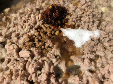 cooked ground meat with seasoning