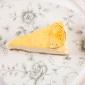 A slice of lemonade pie on a plate.