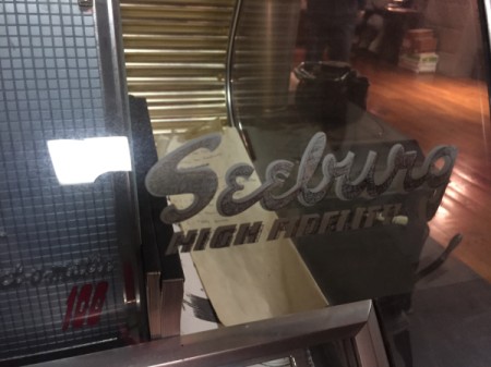 Value of a Seeburg 100 Selectomatic Jukebox - name on the glass/vinyl front