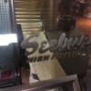 Value of a Seeburg 100 Selectomatic Jukebox - name on the glass/vinyl front