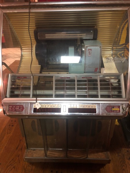 The front of a vintage jukebox.