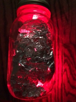 Foil Lined Mason Jar Light  - glowing red light filled Mason jar