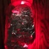 Foil Lined Mason Jar Light  - glowing red light filled Mason jar