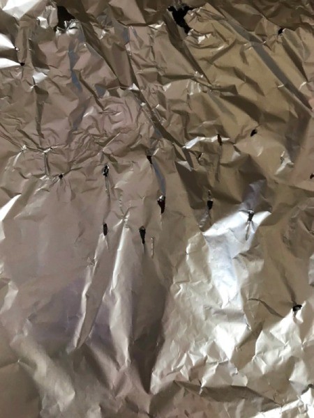 Foil Lined Mason Jar Light - closeup of punctured foil