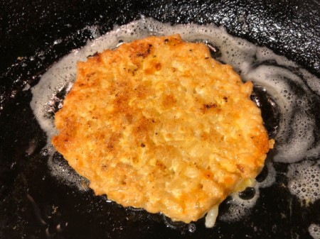 Rice Pancake flipped in pan
