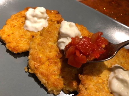 Rice Pancakes on plate with salsa & sour cream