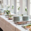A table of catered wedding food.