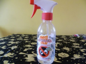 A spray bottle marked "Monster Spray"