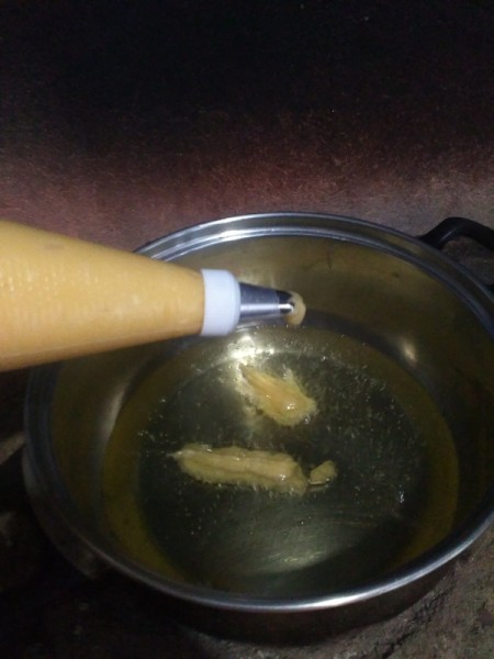 batter dropped in boiling oil