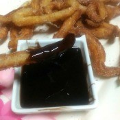 Homemade Mini Churros with chocolate syrup