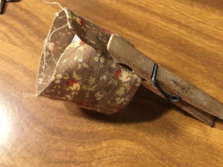 Bottlecap Pincushion - wrap with fabric strip and hold in place with a clothespin until dry