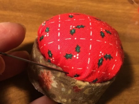 Bottlecap Pincushion - glue the ball into the open end of the cap, pushing in down into the glue
