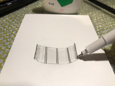 Drum Beat Card - tracing back edge and three sets of vertical lines equally spaced on drum front