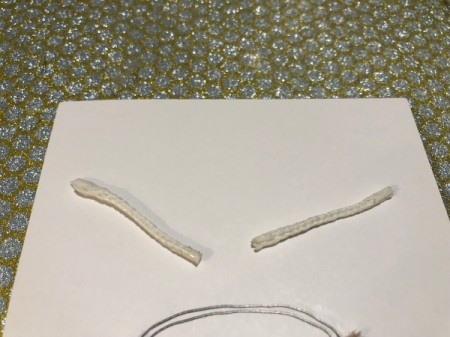 Drum Beat Card - cut two pieces of cord for the drumsticks, add glue to the ends to keep them neat, allow to dry