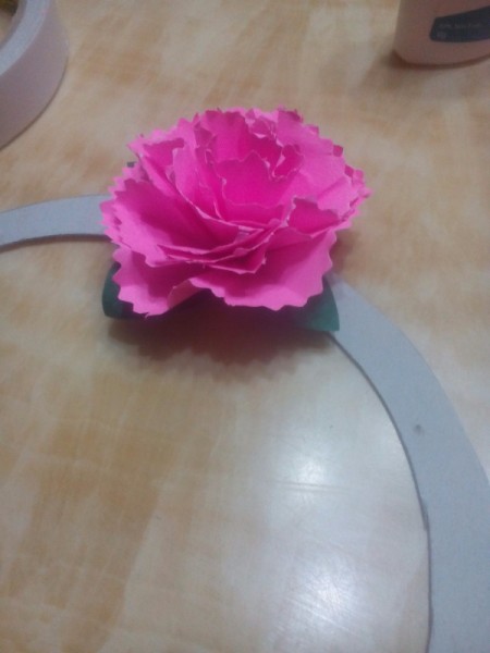 Paper Carnation Wreath - arrange the flowers around the wreath and secure with double sided tape