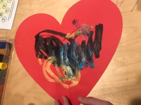 "I Love You" Toddler Artwork - painting completed, with some color out onto the cut heart