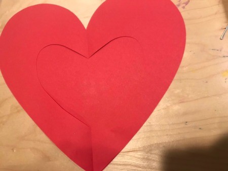 "I Love You" Toddler Artwork - place the open heart over the solid one