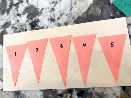 Carrot Counting Activity for Toddlers - use a pen to add numbers to the carrot pockets