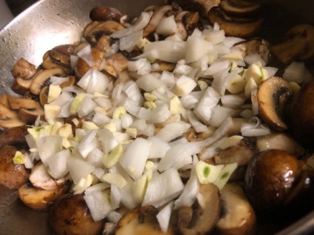 mushrooms and onions in pan