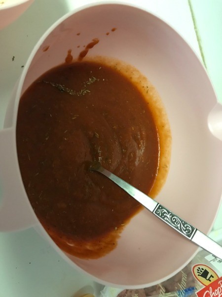 mixing sauce in bowl