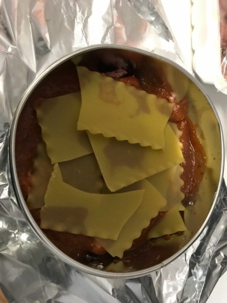 Lasagne noodles on sauce