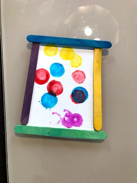 Making a Hanging Air Plant Frame - glue on colored craft sticks