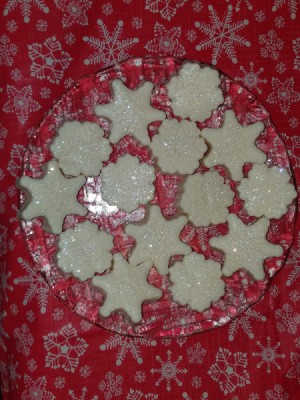 Handmade Bath Products Business Name Ideas - stars and snowflakes on a glass plate on red snowflake background