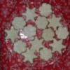 Handmade Bath Products Business Name Ideas - stars and snowflakes on a glass plate on red snowflake background