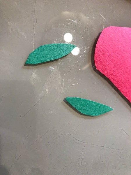 Making a Paper Hand Shaped Flower Bookmark - cut leaf shapes from green paper